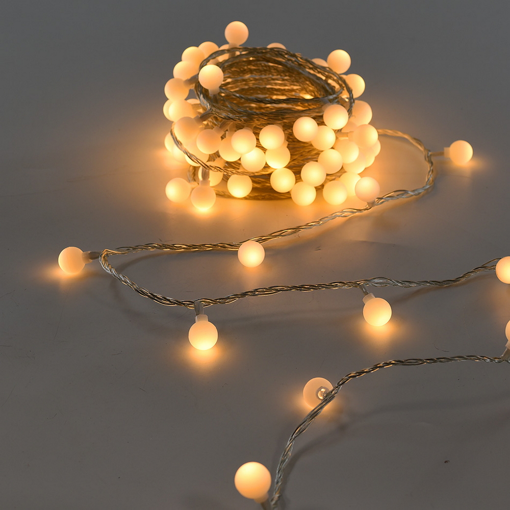 Catena decorata con 60 Perle a Led Bianco Caldo 9 metri cavo trasparente a batteria Wisdom - Foto 1