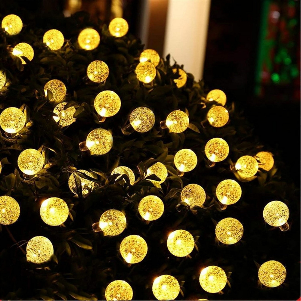 Catena decorata con 60 Perle a Led Bianco Caldo 9 metri cavo verde a batteria Wisdom - Foto 1